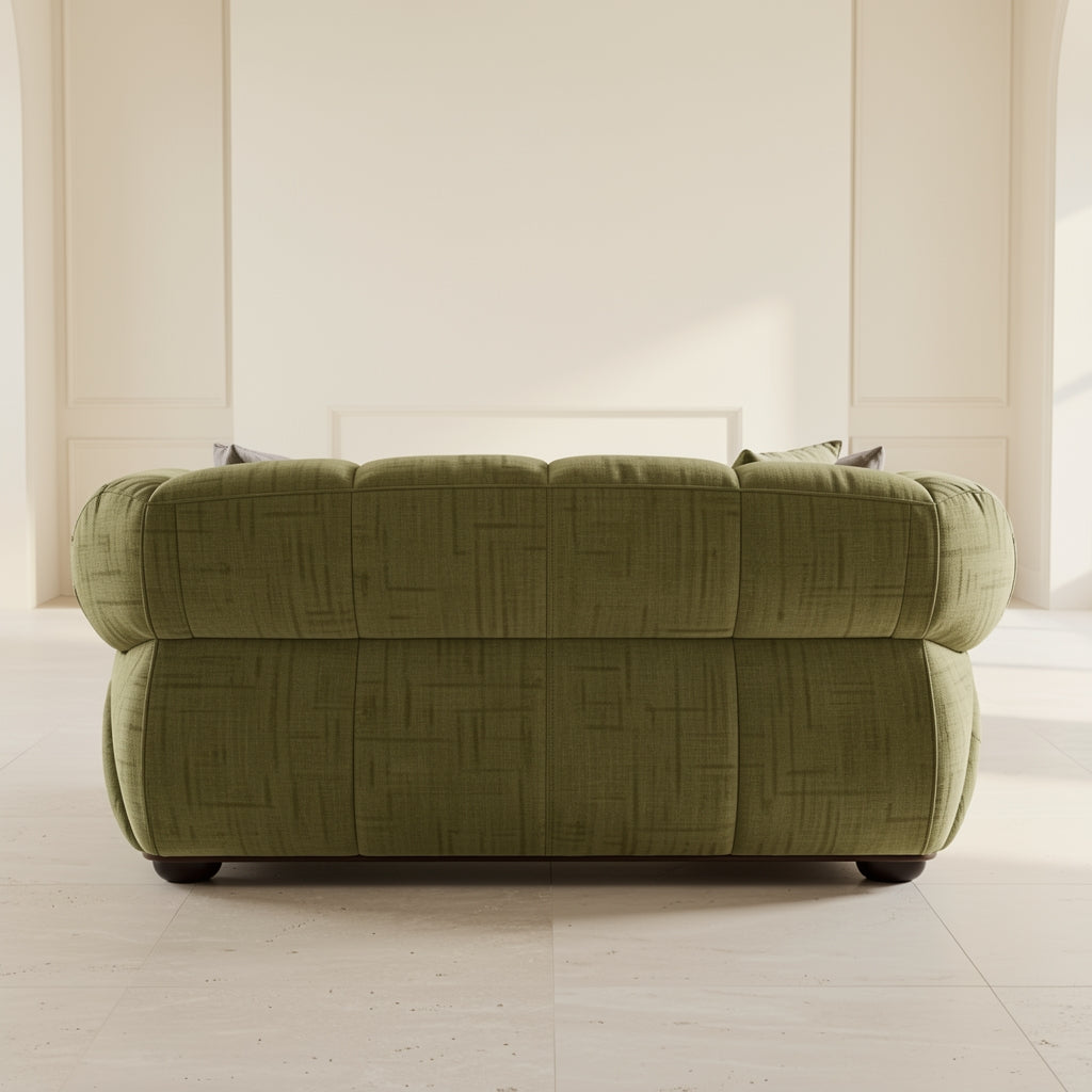Green Tufted Sofa in back