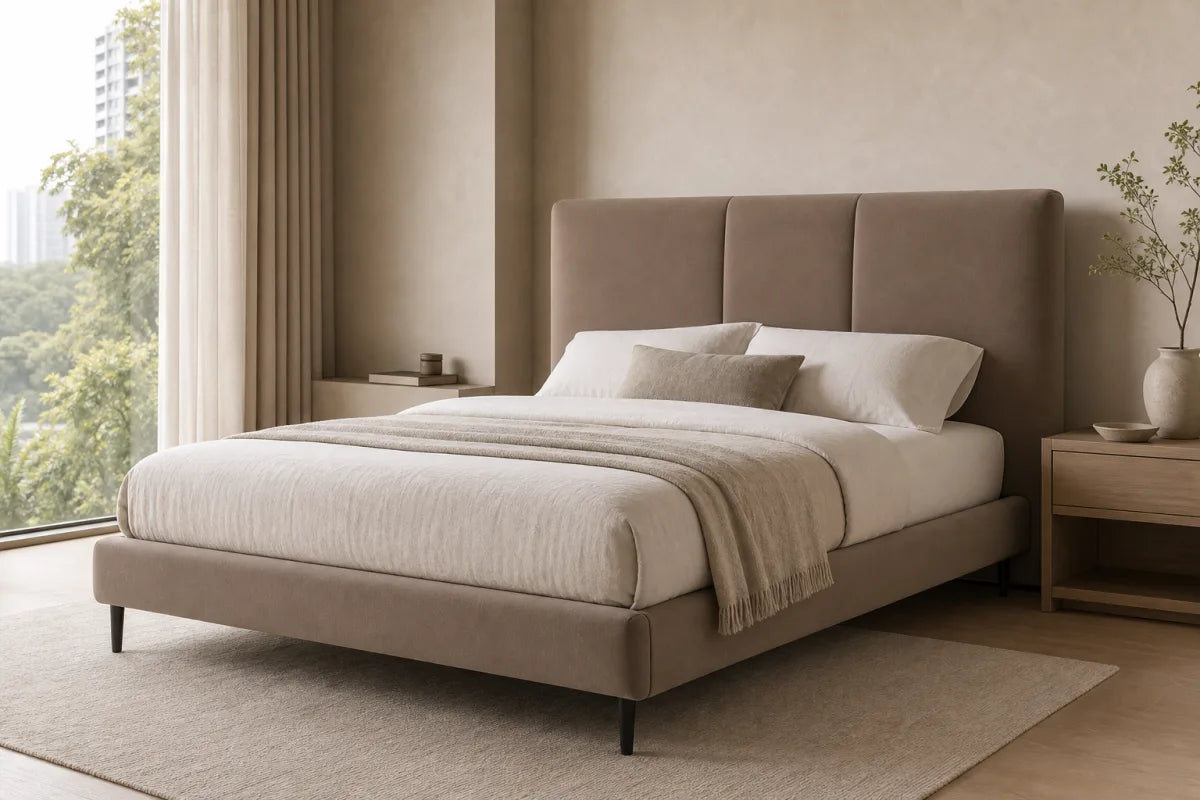 Editorial concept image of an upholstered bed in a calm bedroom